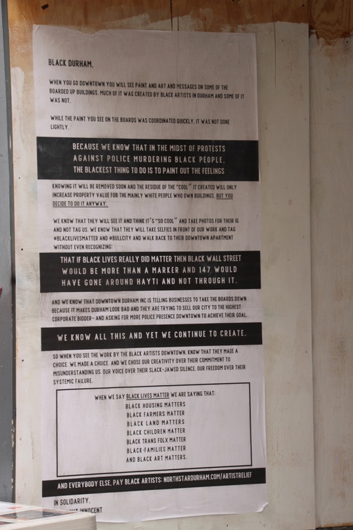A sign addressing Black Durham and Black artists.