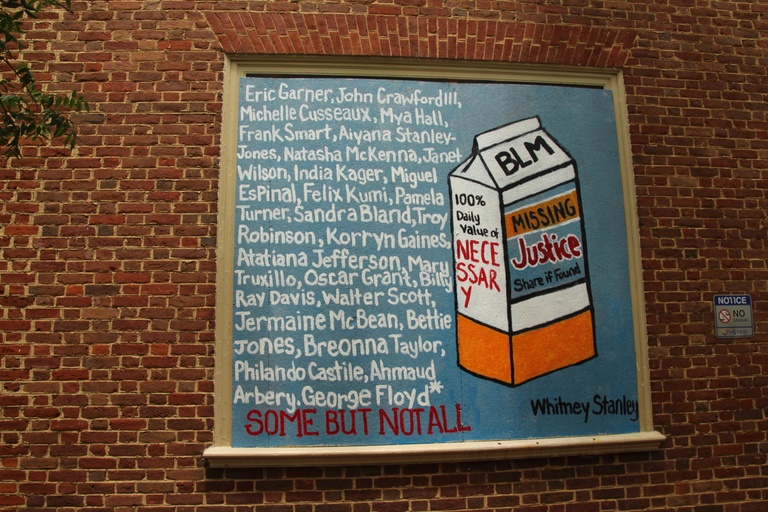 An image of a milk carton with the words "BLM, Missing Justice Share if Found, 100% daily value of necessary" next to a list of names of black people murdered by police and the words "some but not all."